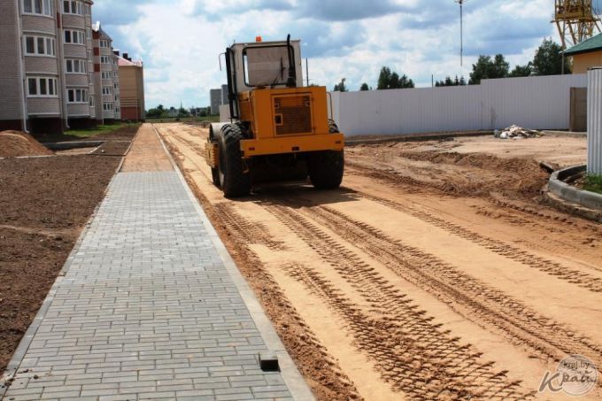 «Работаем в три смены, дома должны сдать в ноябре». Фоторепортаж со строительства двух домов в Северном-2 в Вилейке