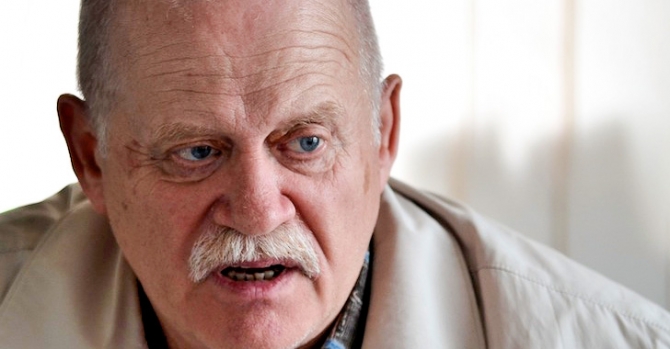 Как, по мнению президента Франции, может быть разрешен политический кризис в Беларуси?